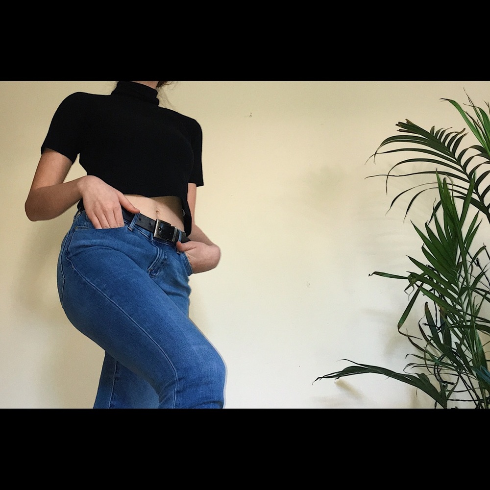 Woman’s short sleeve black knit turtleneck